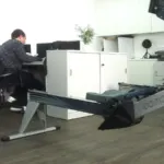 A Concept2 indoor rowing machine in an office
