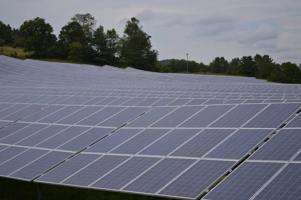 Rows of ground-mounted solar panels at a solar array in Sharon, Vermont