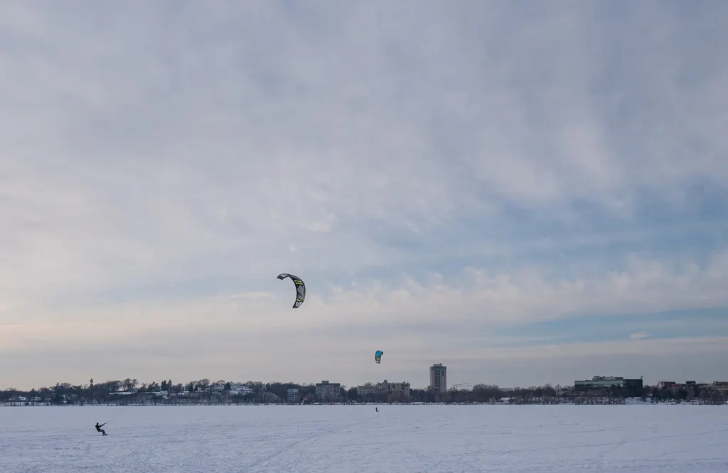 A snowkiter on a frozen lake (illustrative photo, taken in Minneapolis, not Vermont)