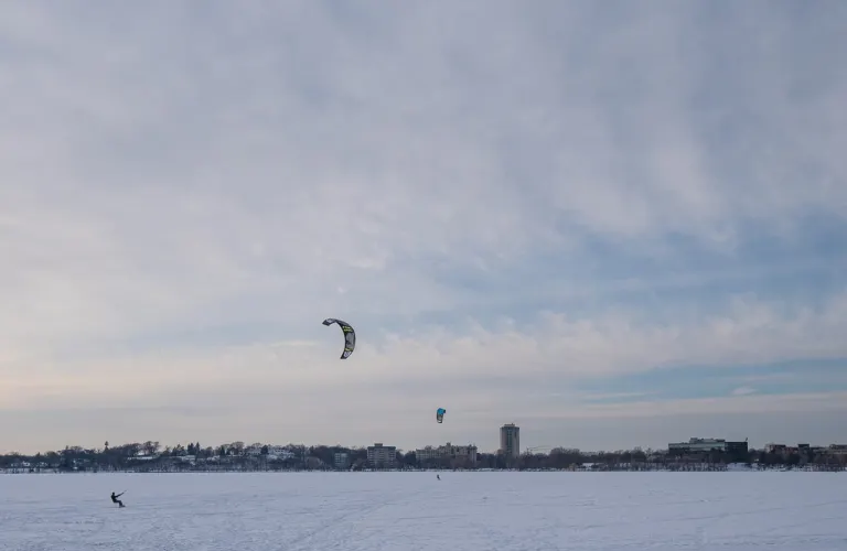 A snowkiter on a frozen lake (illustrative photo, taken in Minneapolis, not Vermont)